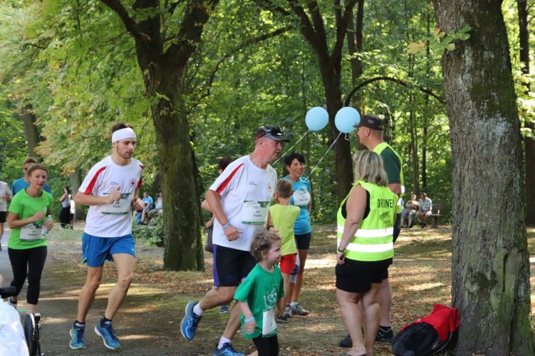 Rennende Menschen bei Vereint Laufen